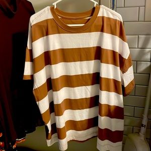 Brown and White stripes purchased with out trying on a little big.